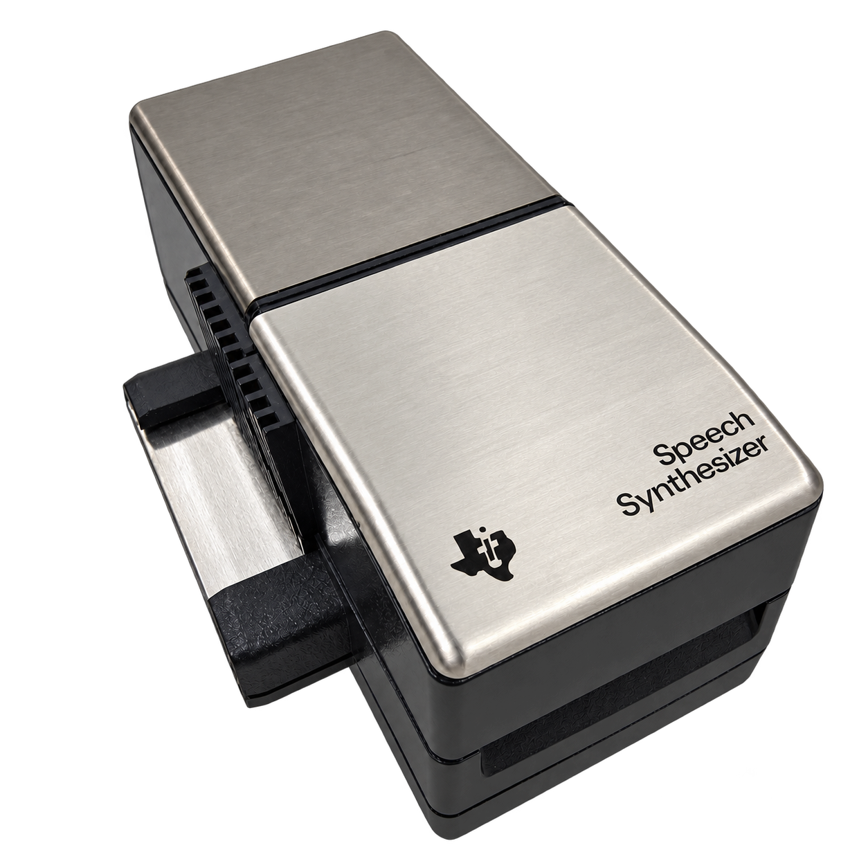 TI Solid State Speech Synthesizer sidecar connected at the computer’s expansion port.